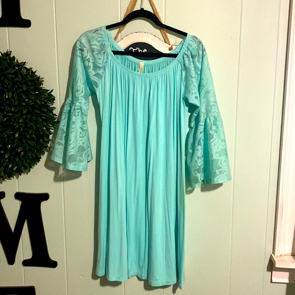 Teal green boutique dress with wide sleeves very cute.